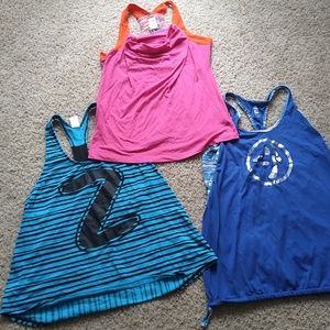 3 size L zumba racerbacks.